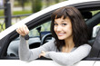 Pretty girl showing the car key