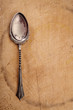 retro desset spoon on old wooden table background retro desset spoon on old wooden table background