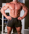 bodybuilder posing in the gym