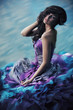 Photo: Cute woman in gorgeous dress Cute woman in gorgeous dress