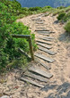 Wooden pathway on sand in Greece Wooden pathway on sand in Greece