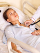 Measurement pressure blood of woman.