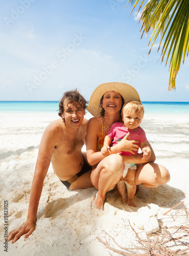 Photo: Family on Maldivian beach Family on Maldivian beach