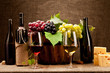 Still life with wine bottles, glasses and grapes Still life with wine bottles, glasses and grapes