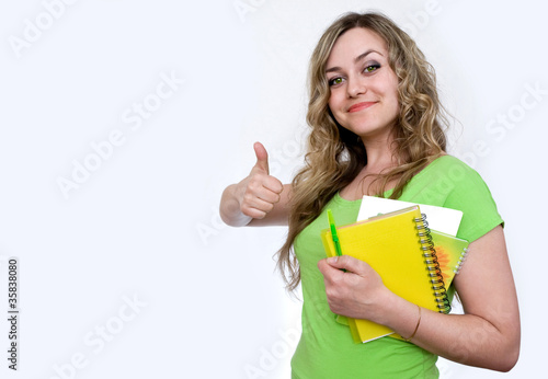 Photo: Attractive girl with a notebook Attractive girl with a notebook
