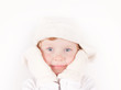 little girl in winter hat with ear flaps