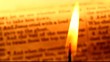Close up of Candle with red background