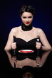 Foto: beautiful brunette woman with chilli pepper beautiful brunette woman with chilli pepper