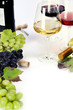 Glasses of white, red and rose wine and grapes