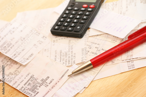 Photo: calculating expenses calculating expenses