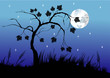 Lone tree at night