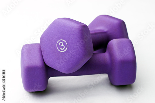 Photo: A pair of 3 lb purple neoprene weights stacked A pair of 3 lb purple neoprene weights stacked