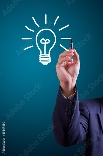 Photo: Hand drawing light bulb Hand drawing light bulb