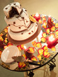 Wedding cake surrounded with candles