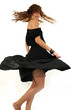 Girl spinning around isolated