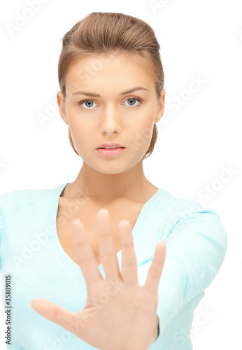 Photo: woman making stop gesture woman making stop gesture