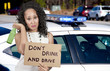 Photo: Woman Holding Sign Woman Holding Sign