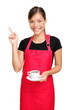 Foto: Waitress pointing holding coffee Waitress pointing holding coffee