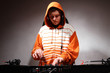 DJ playing music on vinyl turntables