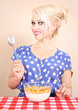 attractive girl is having a breakfast