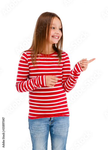 Photo: Girl pointing isolated on white background Girl pointing isolated on white background