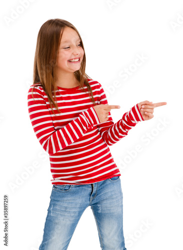 Photo: Girl pointing isolated on white background Girl pointing isolated on white background