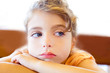Blue eyes sad children girl crossed arms