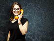 woman using telephone