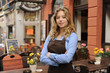 waitress in front of restaurant