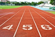 Number four five and six on the start of a running track Number four five and six on the start of a running track