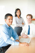 Latino Man Leading Business Meeting
