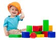 little boy with hard hat and building blocks