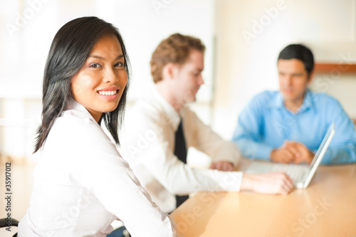 Photo: Asian Business Woman Over Shoulder Asian Business Woman Over Shoulder