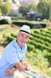 senior visiting a vineyard