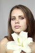 girl with a snow-white lily in hands