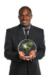 Businessman Holding Tree Inside Crystal Ball