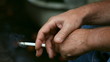 Video: Man holding a smoking cigarette. Man holding a smoking cigarette.