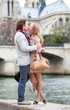 Romantic couple in Paris kissing