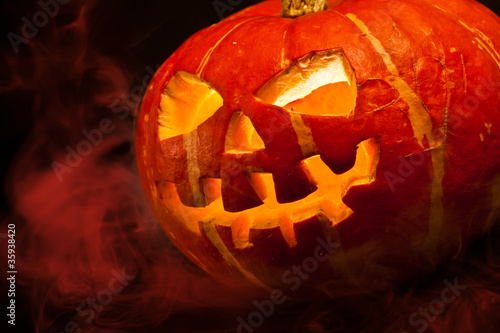 Photo: halloween, old jack-o-lantern on black halloween, old jack-o-lantern on black