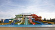 Colourful aquapark slides and swimming-pool