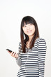 pretty asian woman listening music