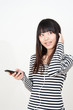 pretty asian woman listening music