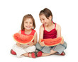 little girls eating watermelon