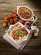 ravioli with ragout sauce on wooden table