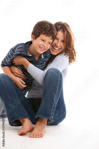 Photo: Happy mother and son on a white background Happy mother and son on a white background