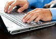 Male hands typing on the laptop Male hands typing on the laptop