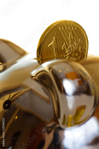 Photo: Euro coin on white background Euro coin on white background