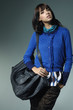 Fashion girl with handbag posing Fashion girl with handbag posing