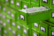 Photo: Old wooden card catalogue with one opened drawer Old wooden card catalogue with one opened drawer