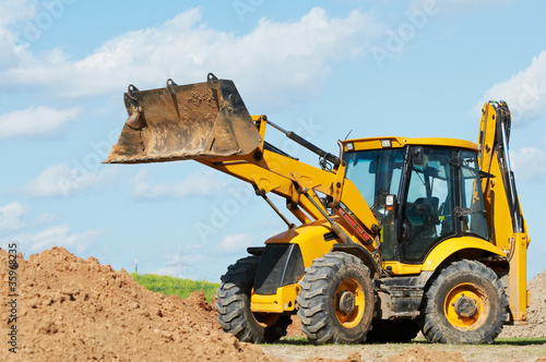 Photo: Excavator Loader with backhoe works Excavator Loader with backhoe works